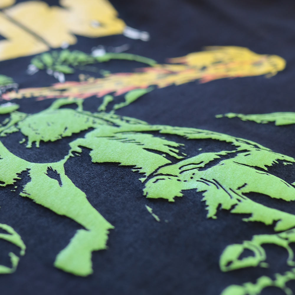 Zoomed-in view of puff screen print detail on Custom Puff Screen Printed TeeStyled TS7000 Black T-shirt.