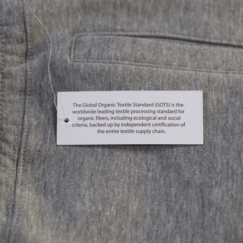 This is a photo of Original Favorite's jogger having a hang tag which describes the fabric.