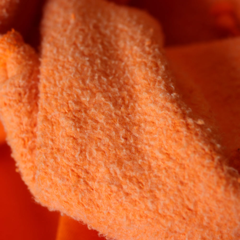 Zoomed in view of the inside of orange joggers