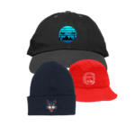 An assortment of four hats with different designs displayed against a white background.