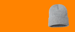 Gray beanie hats on orange background.