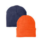 Two knit beanies isolated on white background, one orange and one navy blue.