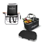 Portable chair with a book holder and a picnic cooler with food items.