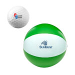 Two branded balls: a golf ball with the "credit union" logo and a larger green and white striped beach ball with the "suntrust" logo.