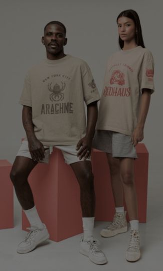 Two models posing in casual t-shirts and shorts for brands with a minimalist backdrop.