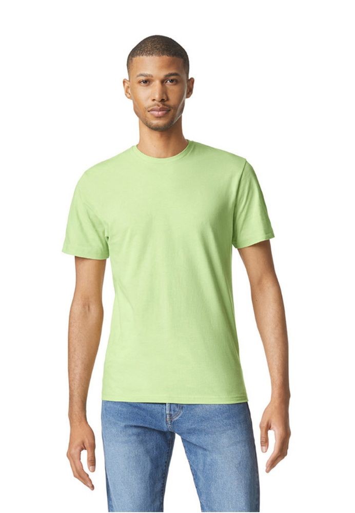 Man wearing a plain light green t-shirt and blue jeans.