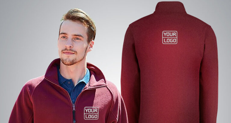 A man wearing a maroon zip-up jacket with a custom embroidered fleece logo on the front left side. The back view of the jacket, featuring the same logo in the center, is also shown. The background is plain grey.