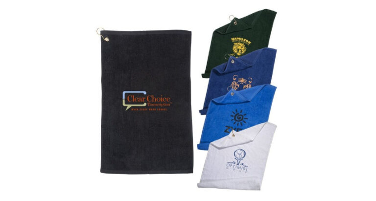 Five embroidered polo shirts in various colors and one personalized golf towel, each featuring different logos and text, displayed against a white background.