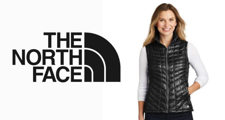 A woman wearing a black, quilted vest stands beside The North Face logo, showcasing the stylish Women's The North Face Vests.
