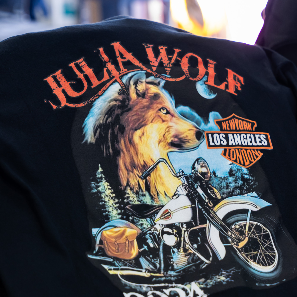 Zoomed in front view of black Gildan 5400 Heavy Cotton™ Long Sleeve T-Shirt with Julia Wolf wolf and motorcycle design, custom printed using digital squeegee technology by Garment Decor - Garment Decor Zoomed in front view of black Gildan 5400 Heavy Cotton™ Long Sleeve T-Shirt with Julia Wolf wolf and motorcycle design, custom printed using digital squeegee technology by Garment Decor