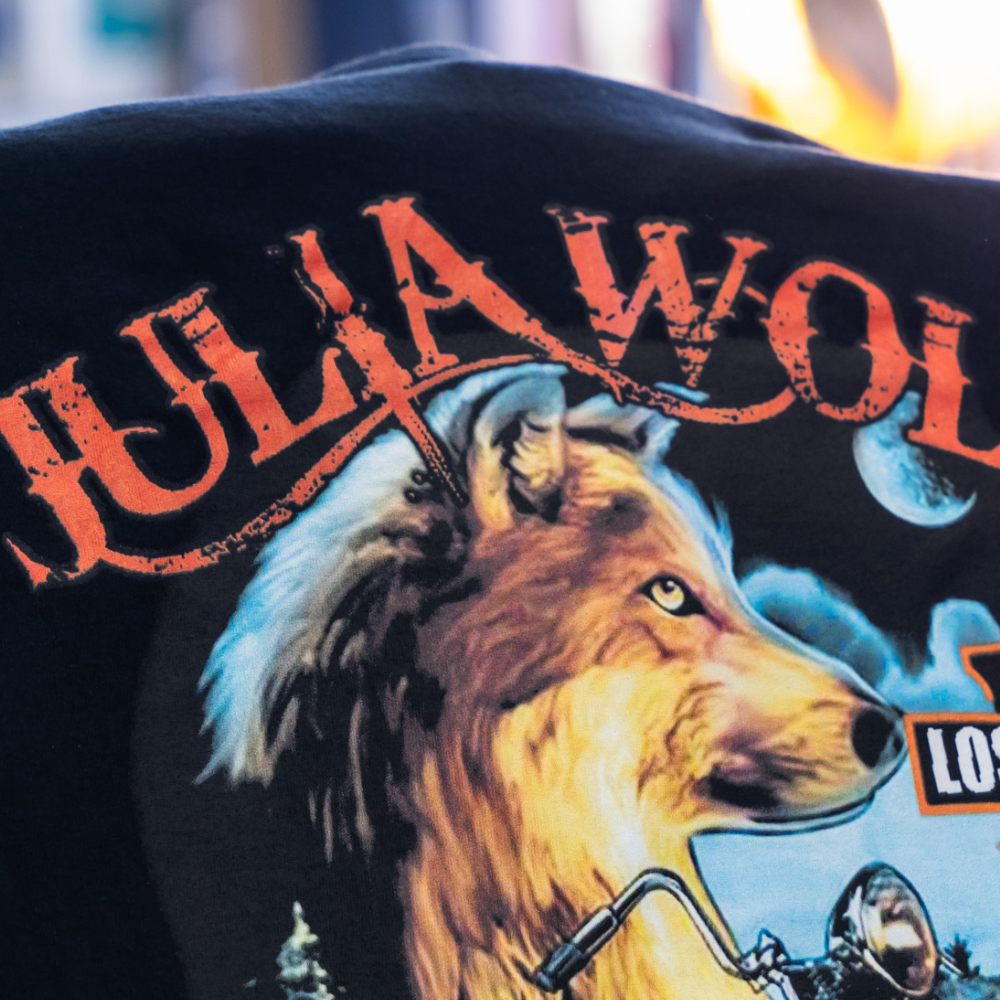 Zoomed in front view of black Gildan 5400 Heavy Cotton™ Long Sleeve T-Shirt with Julia Wolf wolf and motorcycle design, custom printed using digital squeegee technology by Garment Decor - Garment Decor Zoomed in front view of black Gildan 5400 Heavy Cotton™ Long Sleeve T-Shirt with Julia Wolf wolf and motorcycle design, custom printed using digital squeegee technology by Garment Decor