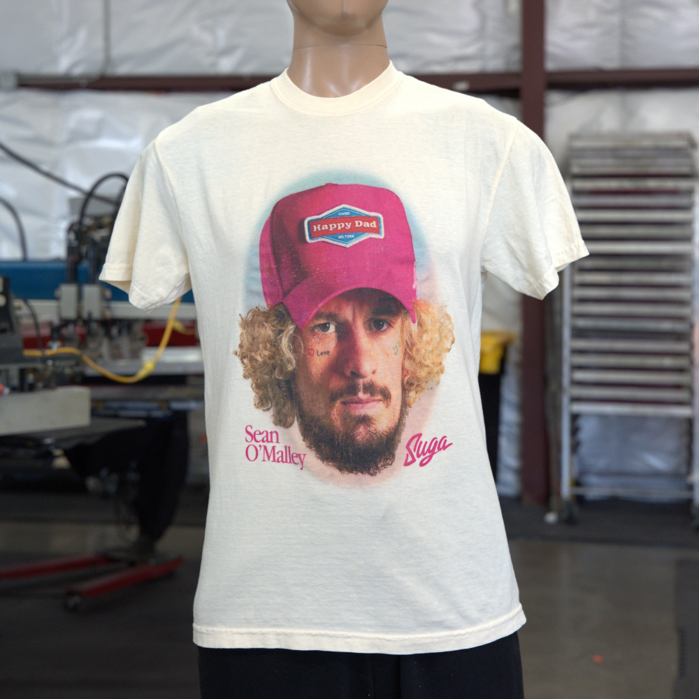 The mannequin wearing the front view of a Natural Hanes 5180 Beefy-T® T-Shirt featuring a vibrant custom digital squeegee print by Garment Decor.