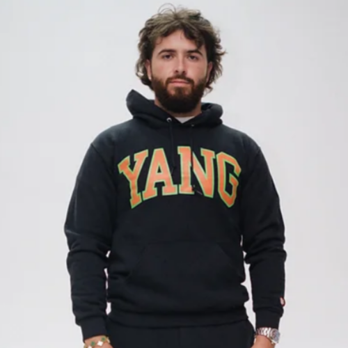 Lane Seven LS14001 Premium Pullover Hoodie and LS16006 Urban Sweatpants in black with custom Yang design, front view by Garment Decor